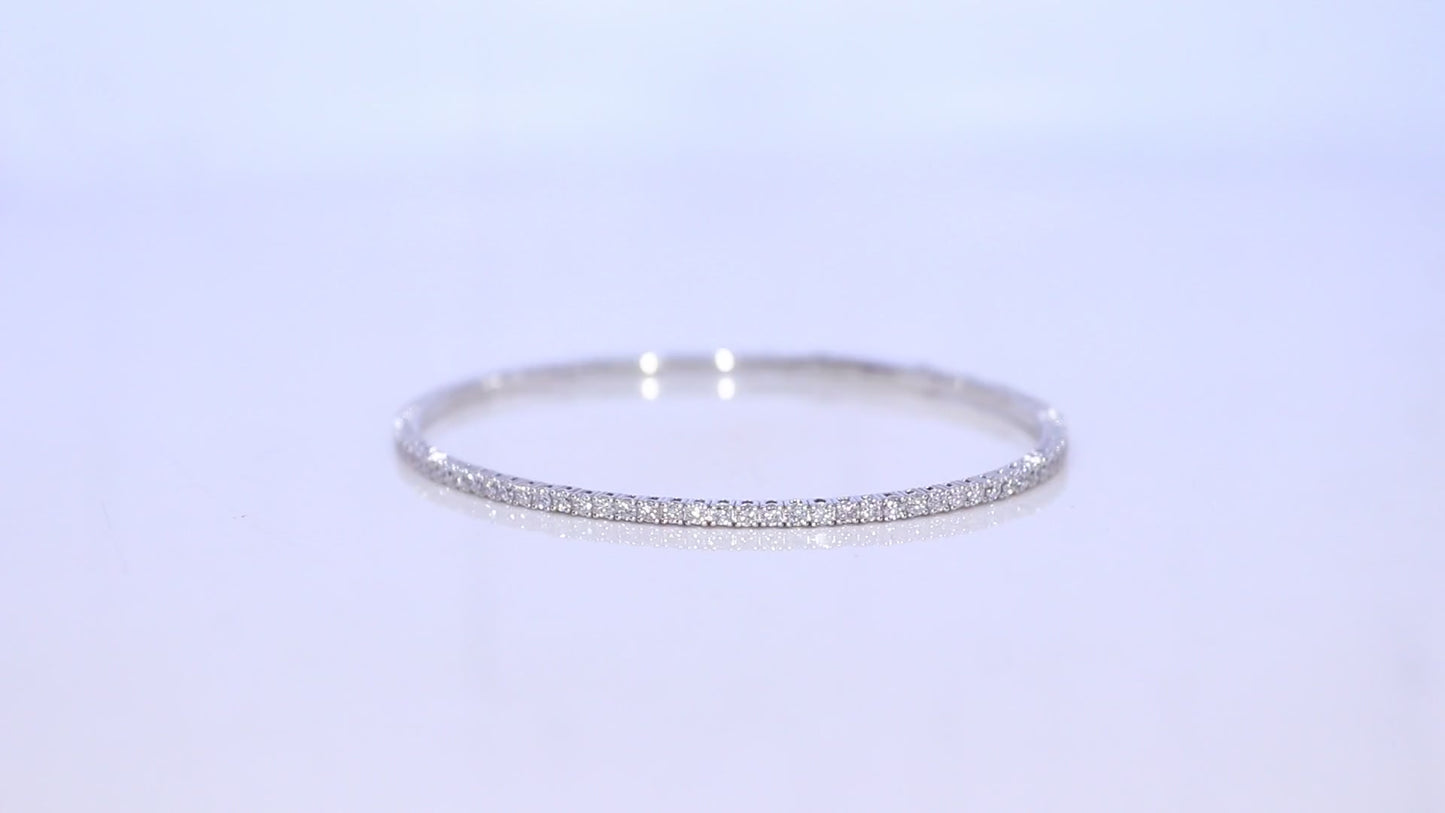 
                  
                    Charger et lire la vidéo dans la visionneuse de la galerie, 1.6mm Luxurious 14K Flex Tennis Bangle
                  
                